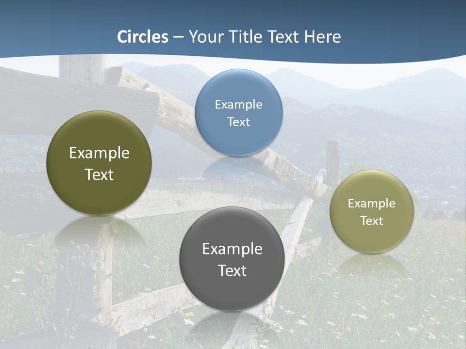 A Wooden Fence In A Grassy Field With Mountains In The Background PowerPoint Template