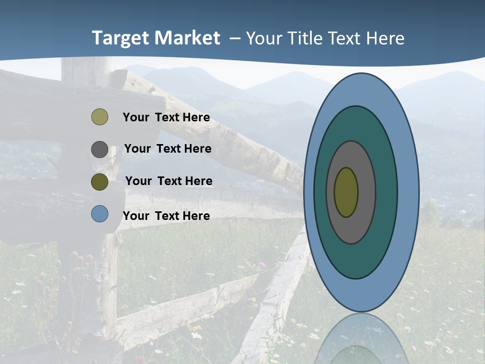 A Wooden Fence In A Grassy Field With Mountains In The Background PowerPoint Template