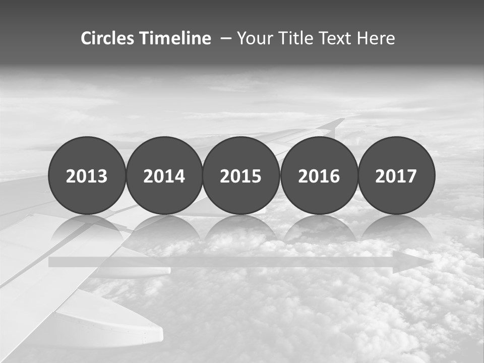 A View Of The Wing Of An Airplane In The Sky PowerPoint Template