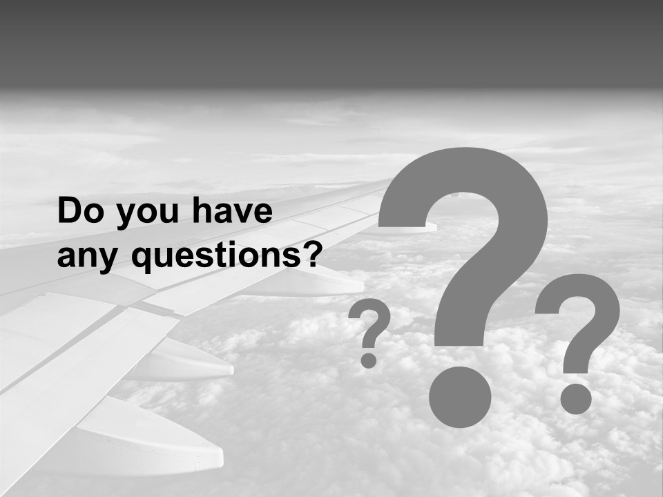 A View Of The Wing Of An Airplane In The Sky PowerPoint Template