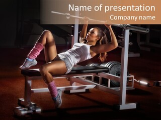A Woman Is Doing A Bench Press Exercise PowerPoint Template