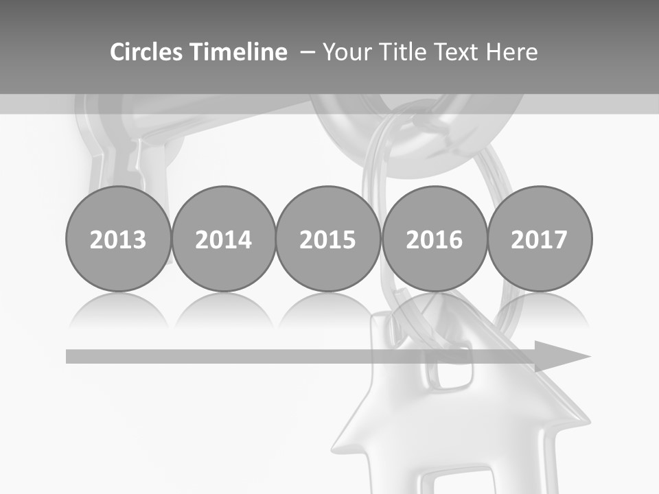 A House Key On A Key Chain With A House On It PowerPoint Template