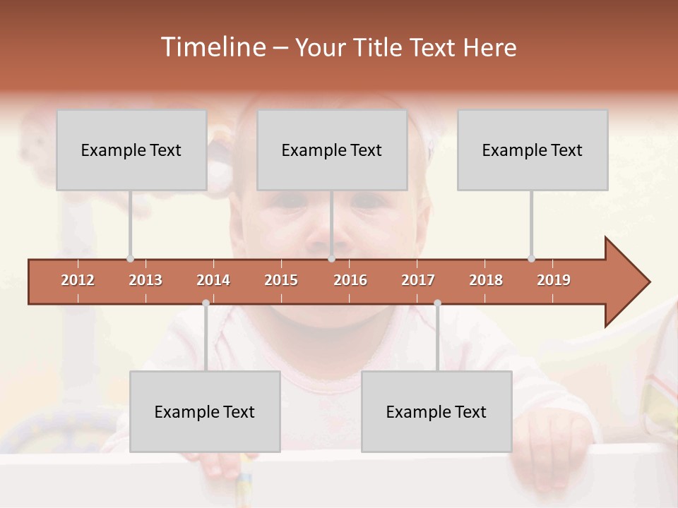 A Baby Is Holding A Toothbrush In His Hand PowerPoint Template