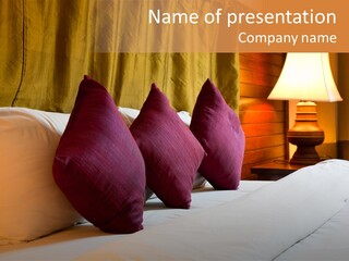 A Bed With Three Pillows And A Lamp PowerPoint Template