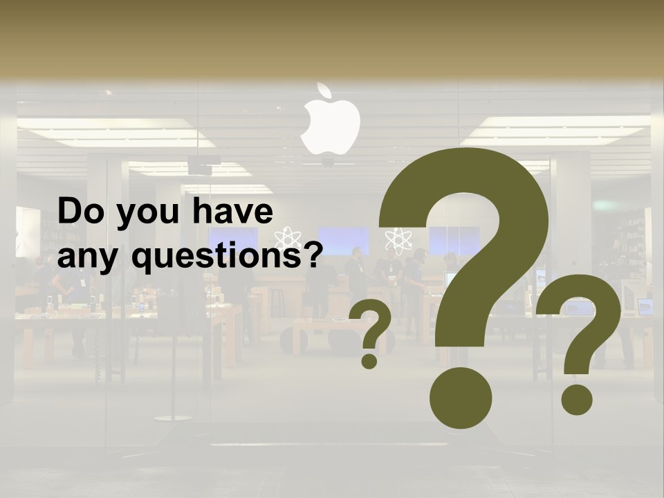 A Group Of People Standing Inside Of An Apple Store PowerPoint Template