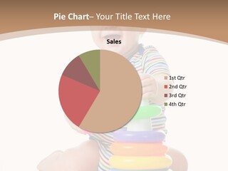 A Baby Playing With A Stack Of Colorful Toys PowerPoint Template