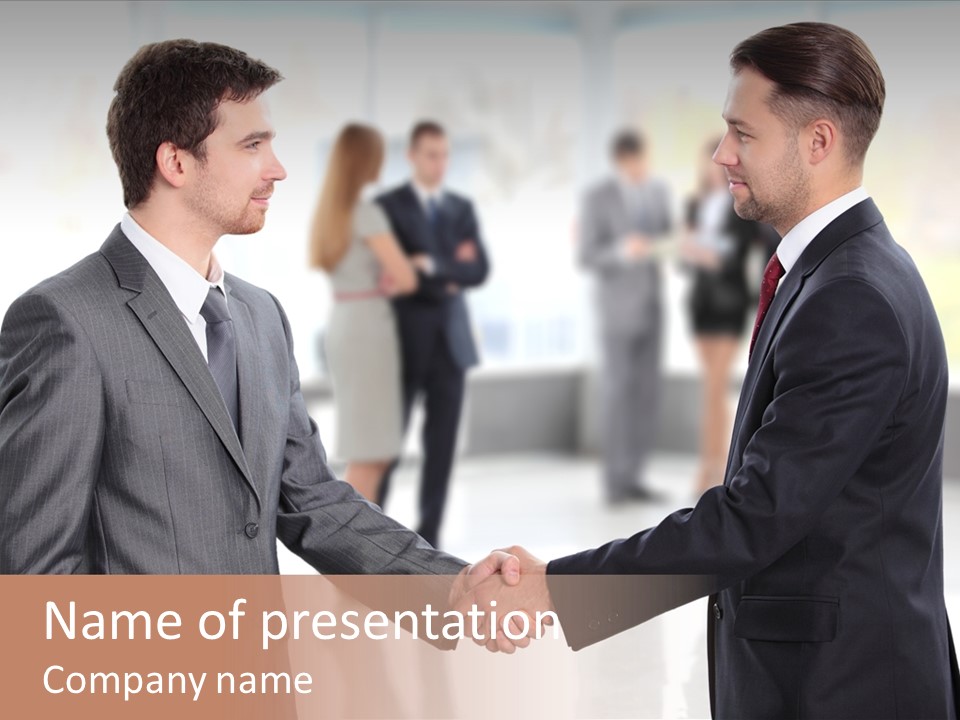 Two Men Shaking Hands In Front Of A Group Of People PowerPoint Template