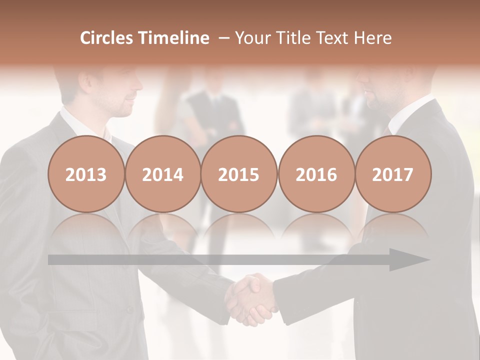 Two Men Shaking Hands In Front Of A Group Of People PowerPoint Template