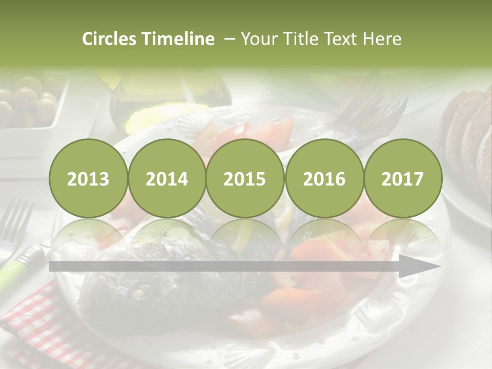 A Fish On A Plate Next To A Salad And Bread PowerPoint Template