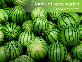 A Pile Of Watermelons With A Green Background PowerPoint Template