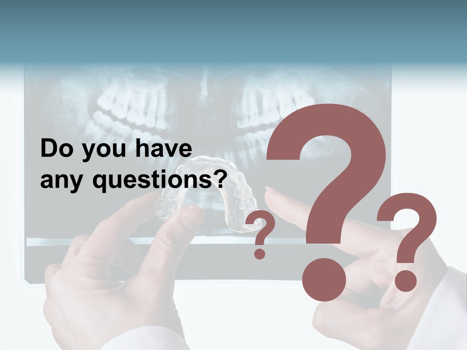 A Person Holding A Tooth In Front Of A X - Ray PowerPoint Template