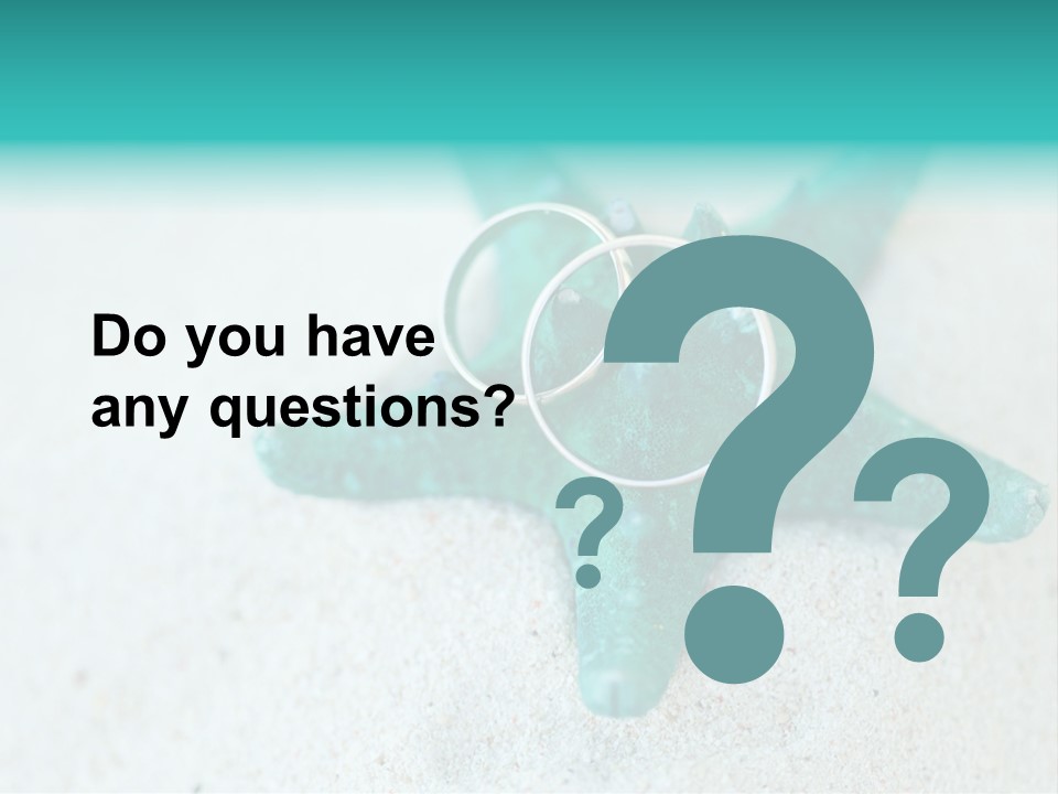 A Starfish With A Ring On It Is On The Sand PowerPoint Template