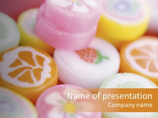 A Bunch Of Different Colored Candies In A Bowl PowerPoint Template