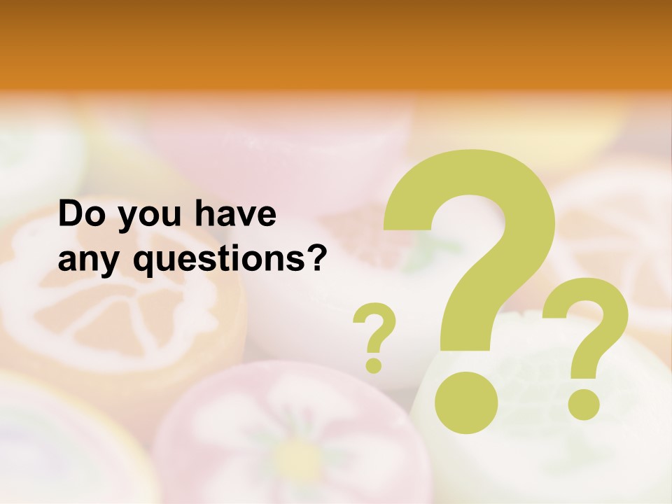 A Bunch Of Different Colored Candies In A Bowl PowerPoint Template