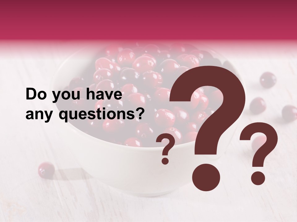 A Bowl Of Cranberries On A White Table PowerPoint Template