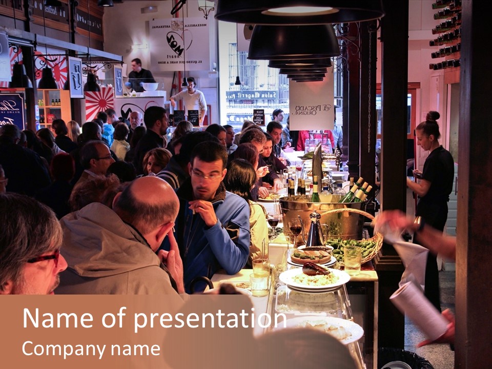 A Group Of People Sitting At A Table In A Restaurant PowerPoint Template