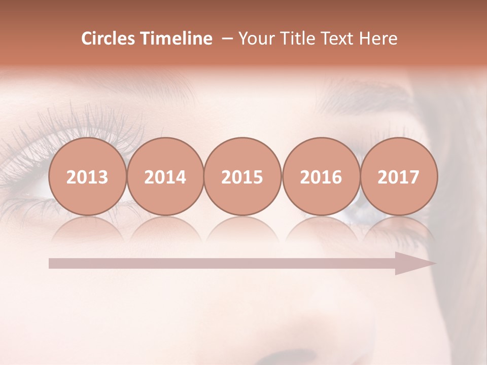 A Woman's Blue Eyes With Long Eyelashes PowerPoint Template
