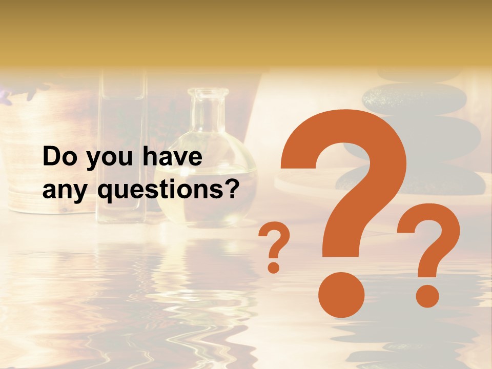 A Vase With Flowers And Rocks On A Table PowerPoint Template