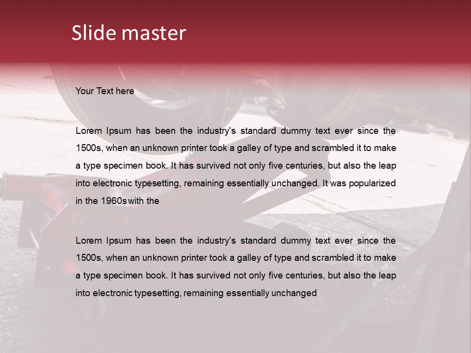 A Close Up Of A Red Jack Under A Car PowerPoint Template