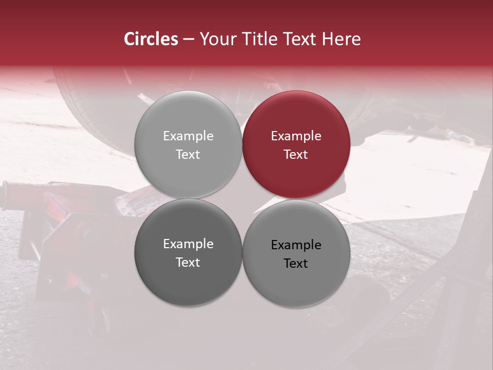 A Close Up Of A Red Jack Under A Car PowerPoint Template