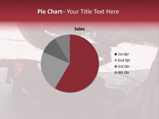 A Close Up Of A Red Jack Under A Car PowerPoint Template