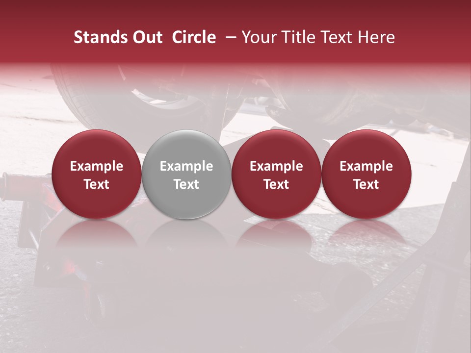 A Close Up Of A Red Jack Under A Car PowerPoint Template