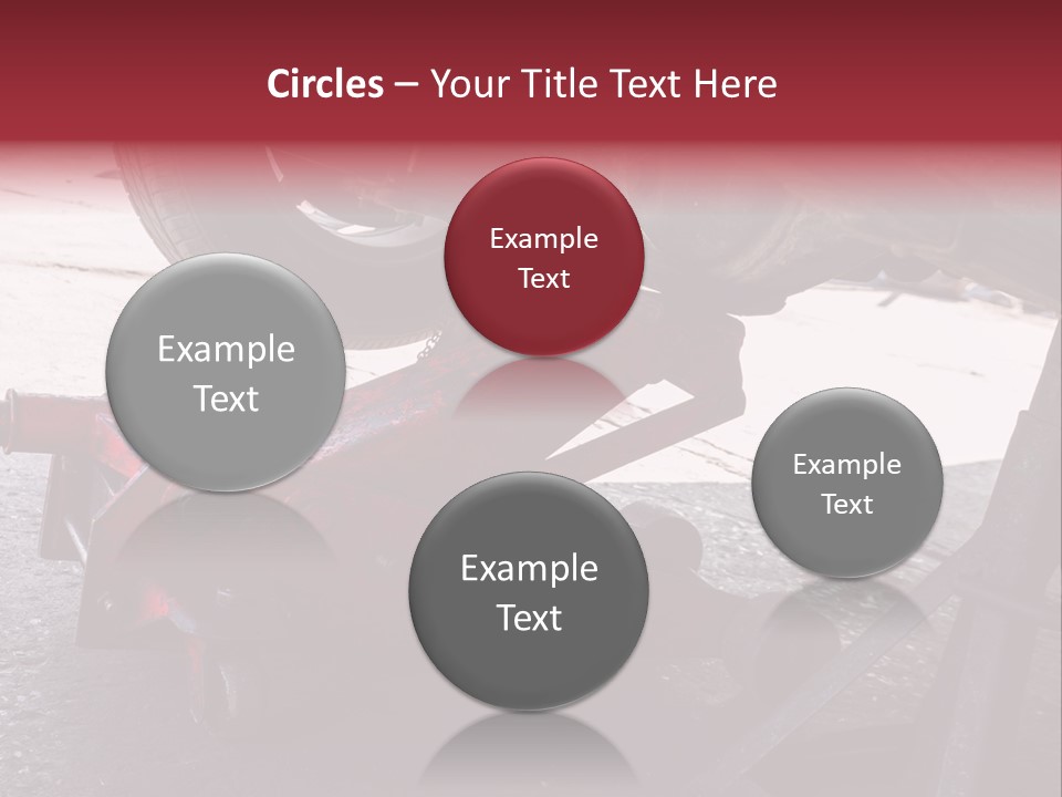 A Close Up Of A Red Jack Under A Car PowerPoint Template