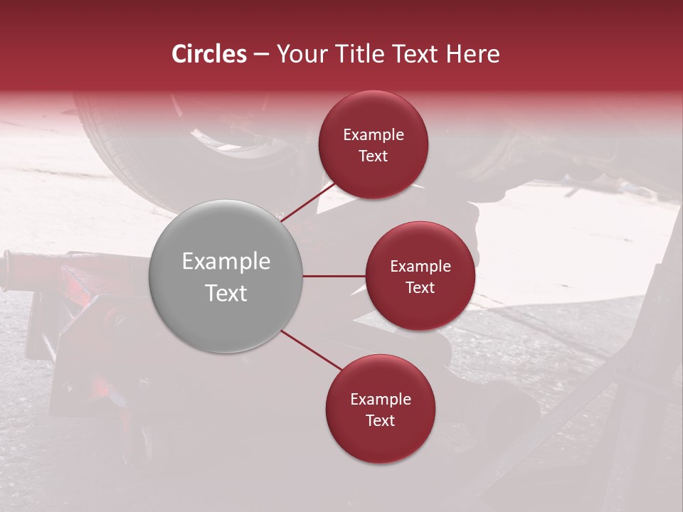 A Close Up Of A Red Jack Under A Car PowerPoint Template