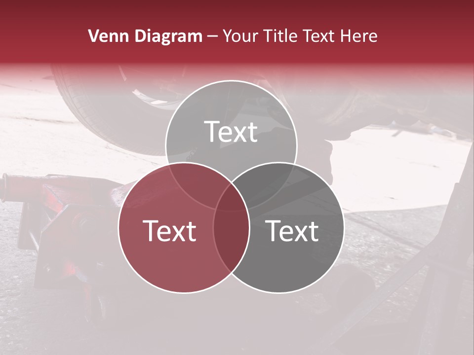 A Close Up Of A Red Jack Under A Car PowerPoint Template