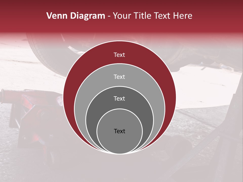 A Close Up Of A Red Jack Under A Car PowerPoint Template