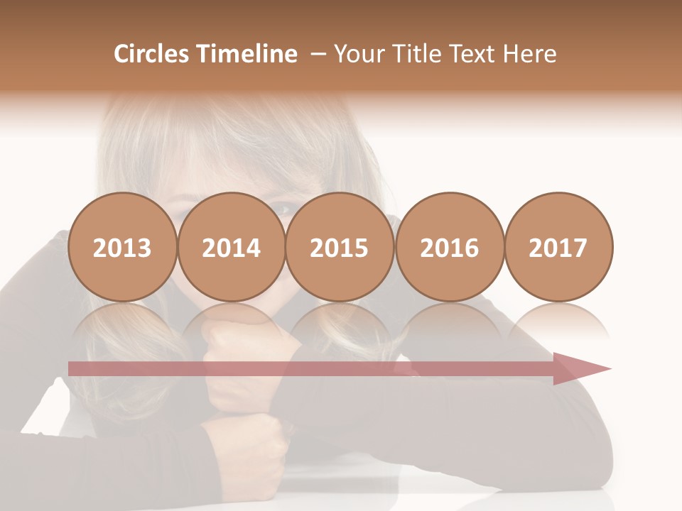 A Woman Sitting At A Table With Her Hand On Her Chin PowerPoint Template