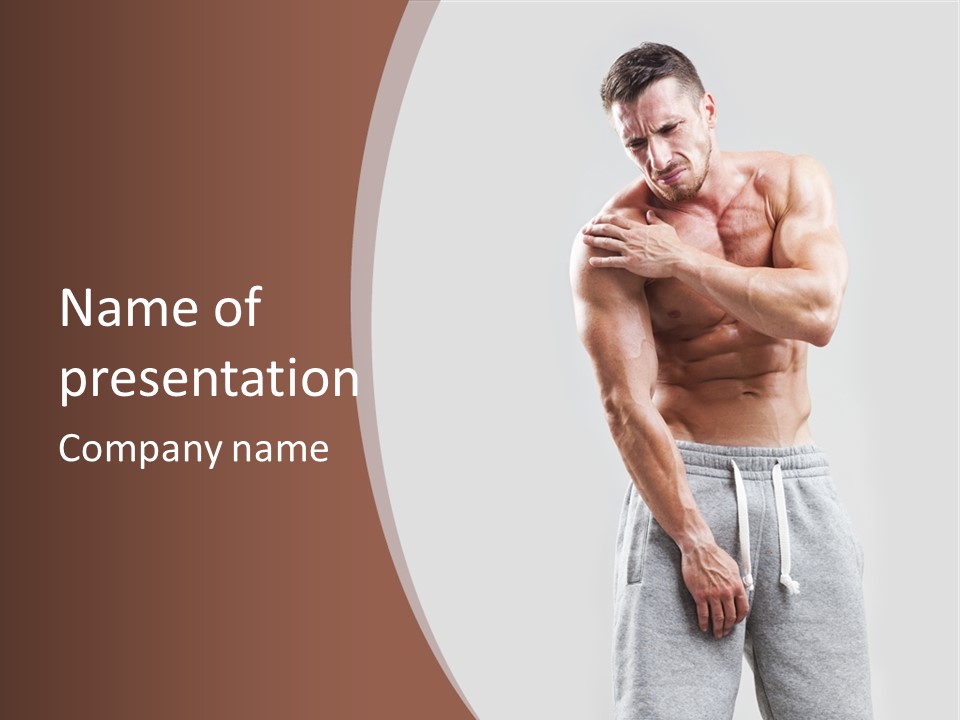 A Man With A Muscular Body Is Posing For The Camera PowerPoint Template