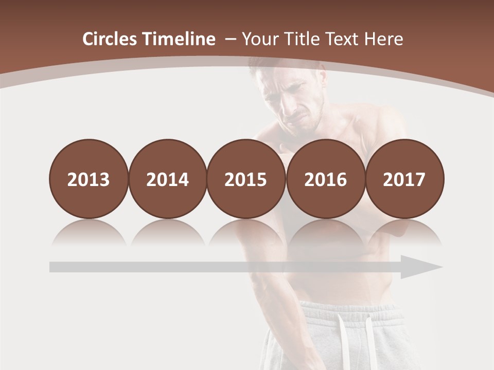 A Man With A Muscular Body Is Posing For The Camera PowerPoint Template