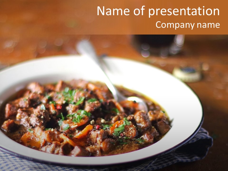A Bowl Of Food On A Table With A Spoon PowerPoint Template