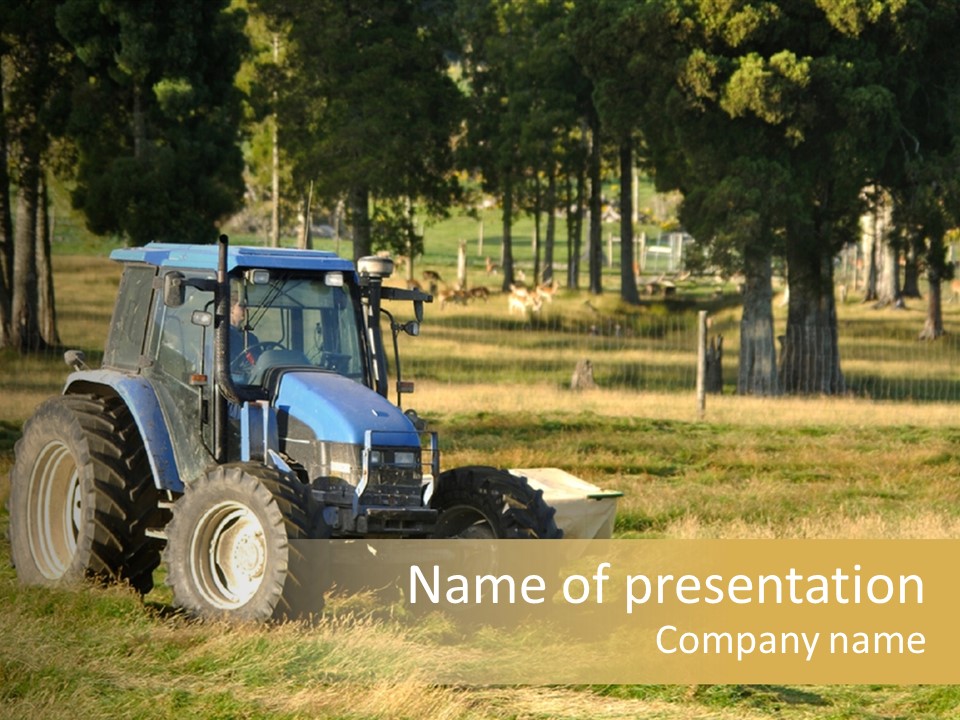 A Tractor In A Field With Trees In The Background PowerPoint Template