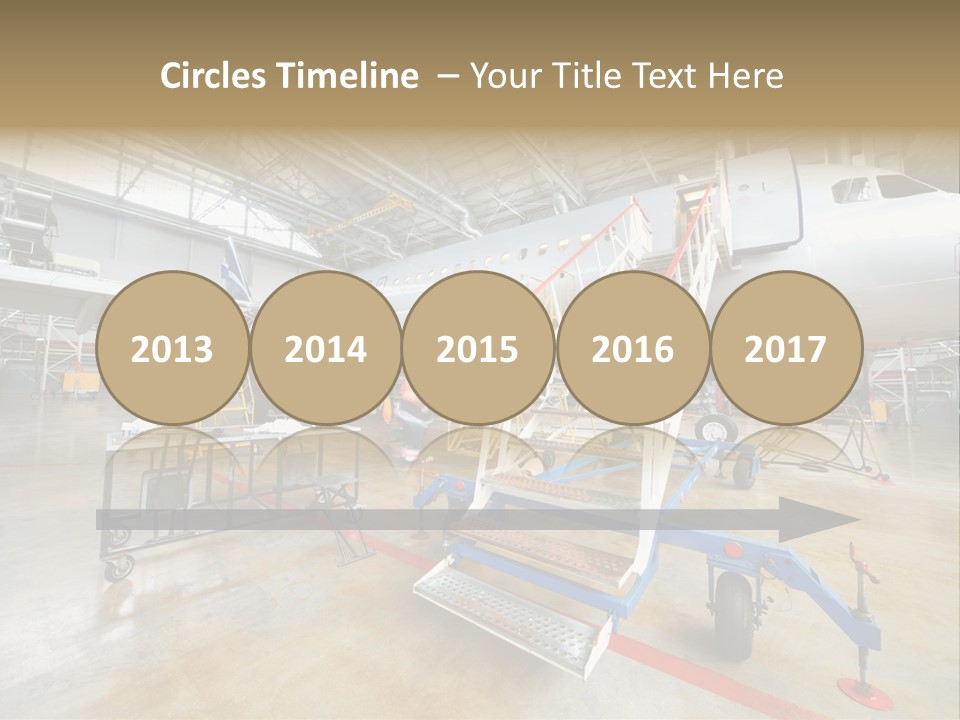 A Large Jetliner Sitting Inside Of A Hangar PowerPoint Template