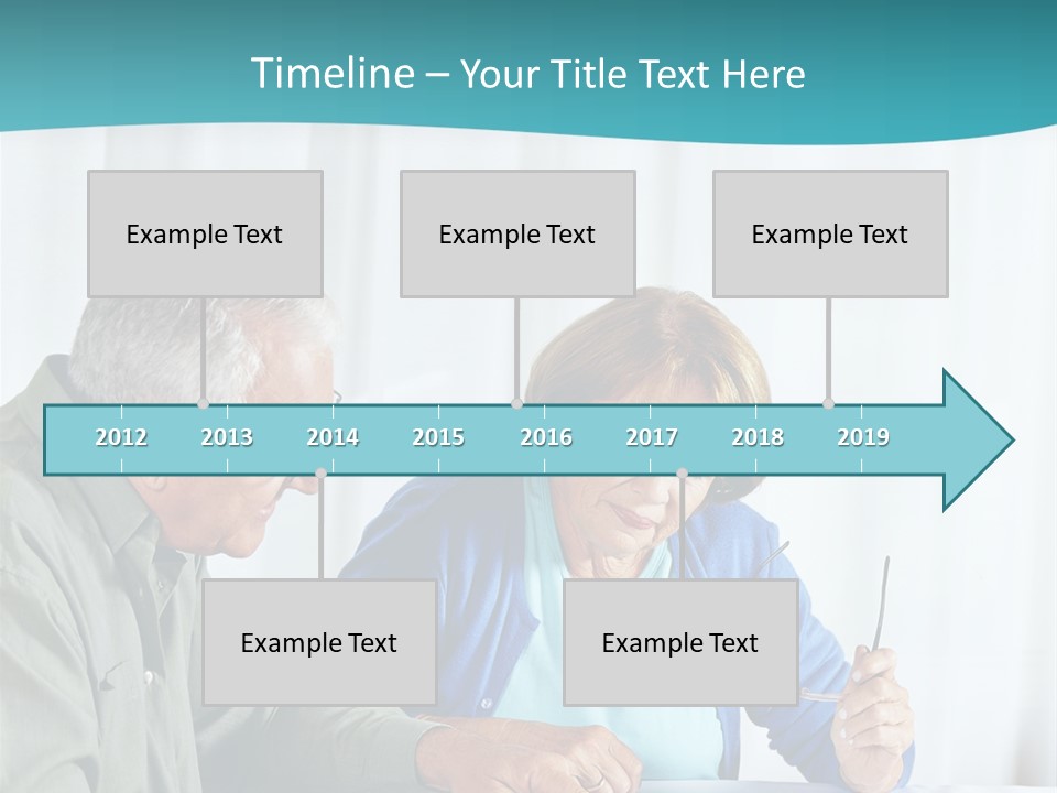 A Man And Woman Sitting At A Table Writing On A Piece Of Paper PowerPoint Template