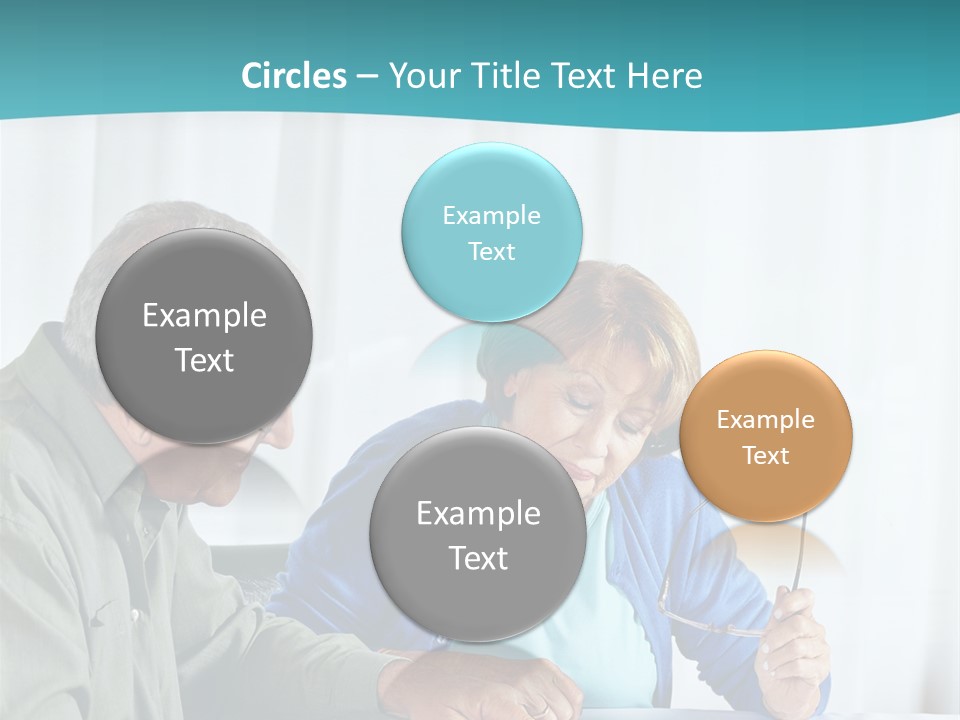 A Man And Woman Sitting At A Table Writing On A Piece Of Paper PowerPoint Template