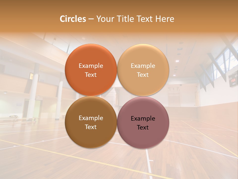 A Large Gymnasium With A Basketball Court And Wooden Floors PowerPoint Template