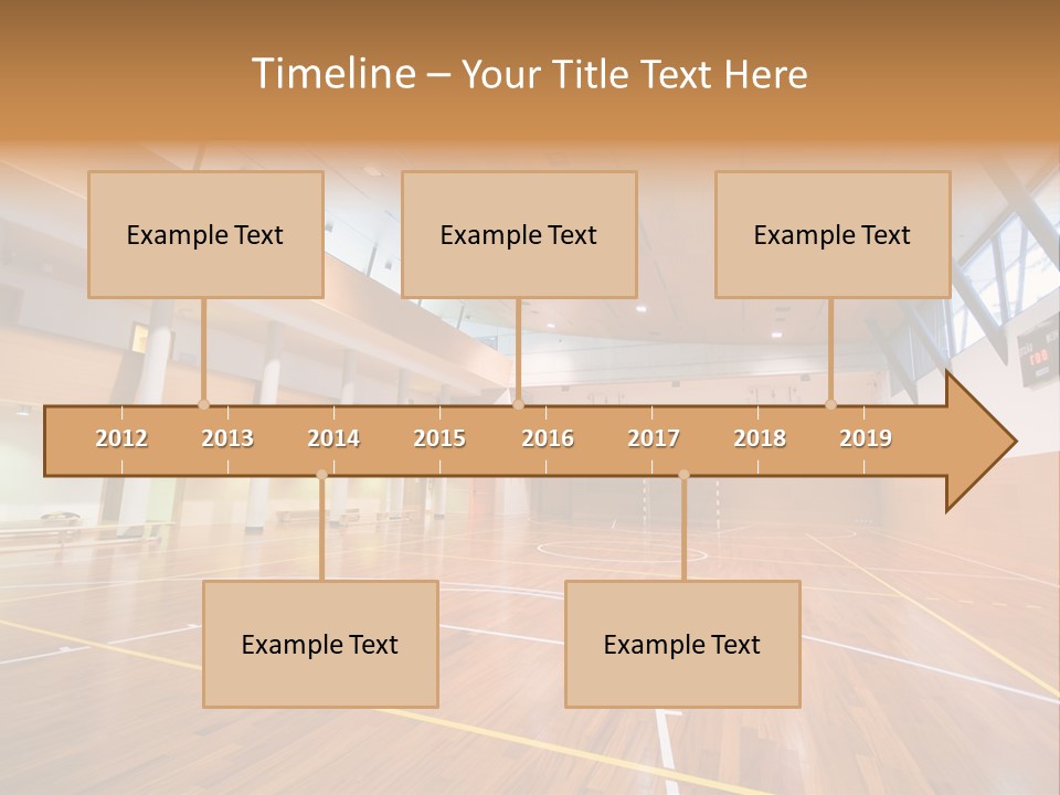 A Large Gymnasium With A Basketball Court And Wooden Floors PowerPoint Template