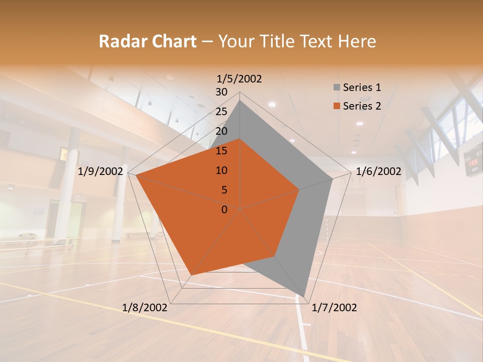 A Large Gymnasium With A Basketball Court And Wooden Floors PowerPoint Template