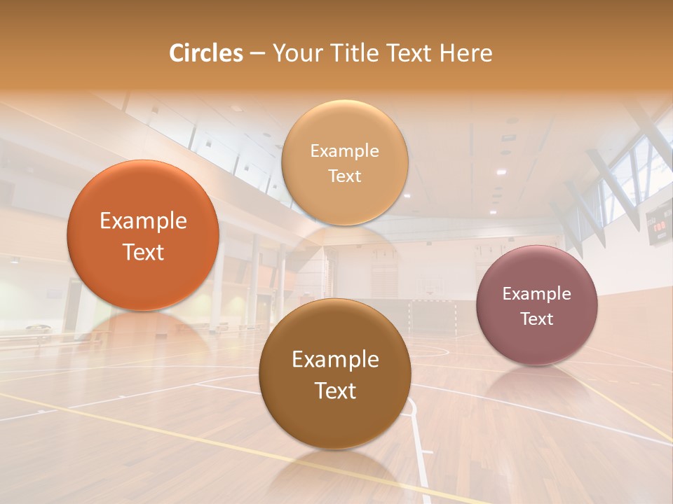 A Large Gymnasium With A Basketball Court And Wooden Floors PowerPoint Template