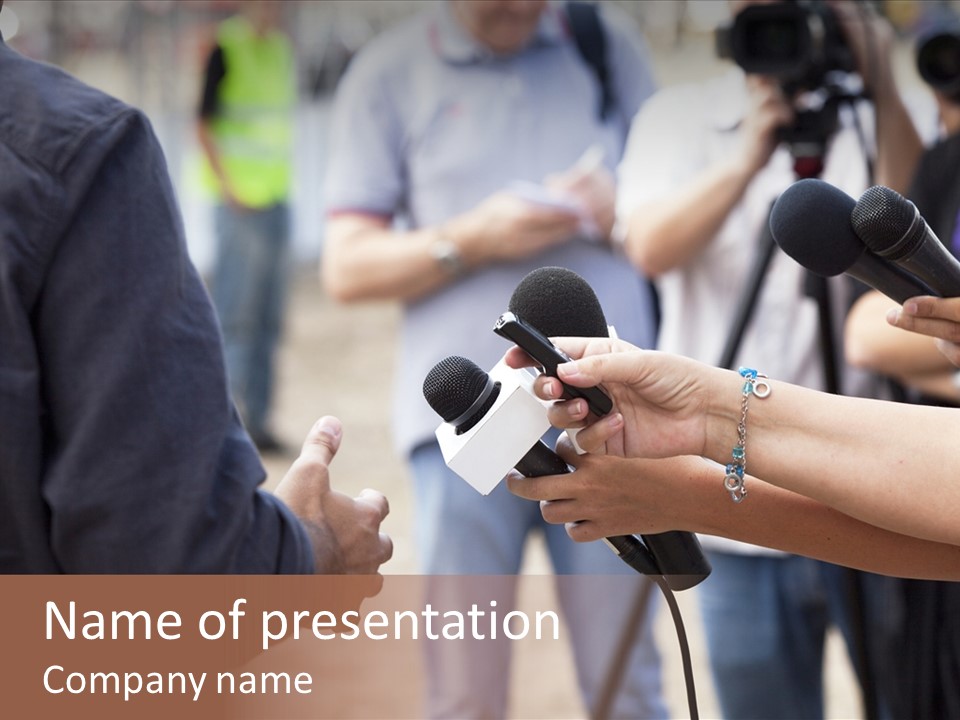 A Group Of People Holding Microphones In Front Of Microphones PowerPoint Template