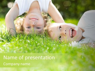 Two Children Laying In The Grass With Their Mouths Open PowerPoint Template