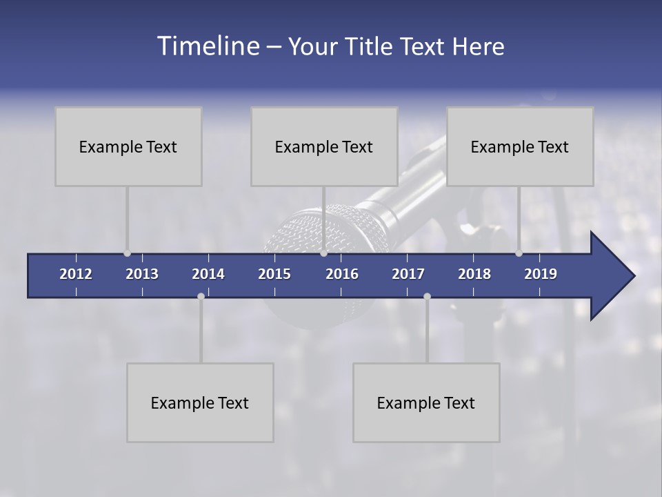 A Microphone In Front Of A Row Of Seats PowerPoint Template