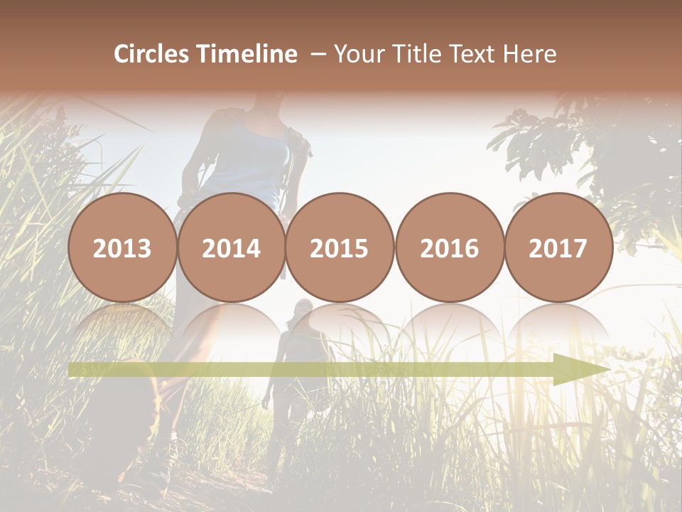 A Couple Of People That Are Walking In The Grass PowerPoint Template