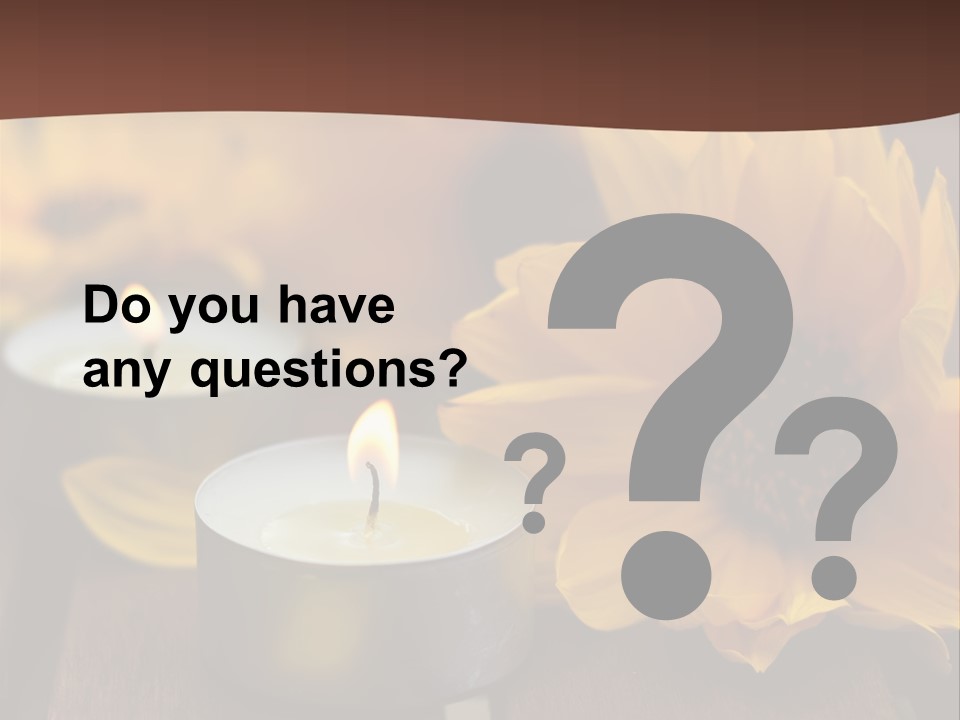 Three Candles With Yellow Flowers On A Wooden Table PowerPoint Template