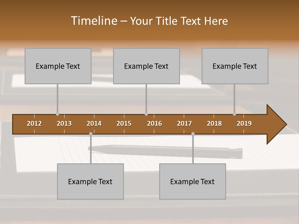 A Table With A Pen And Paper On It PowerPoint Template