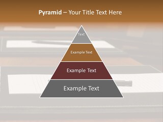 A Table With A Pen And Paper On It PowerPoint Template