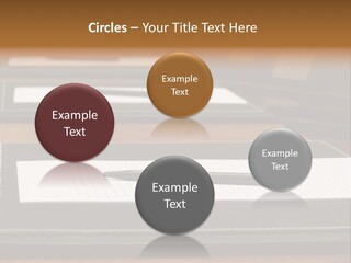A Table With A Pen And Paper On It PowerPoint Template